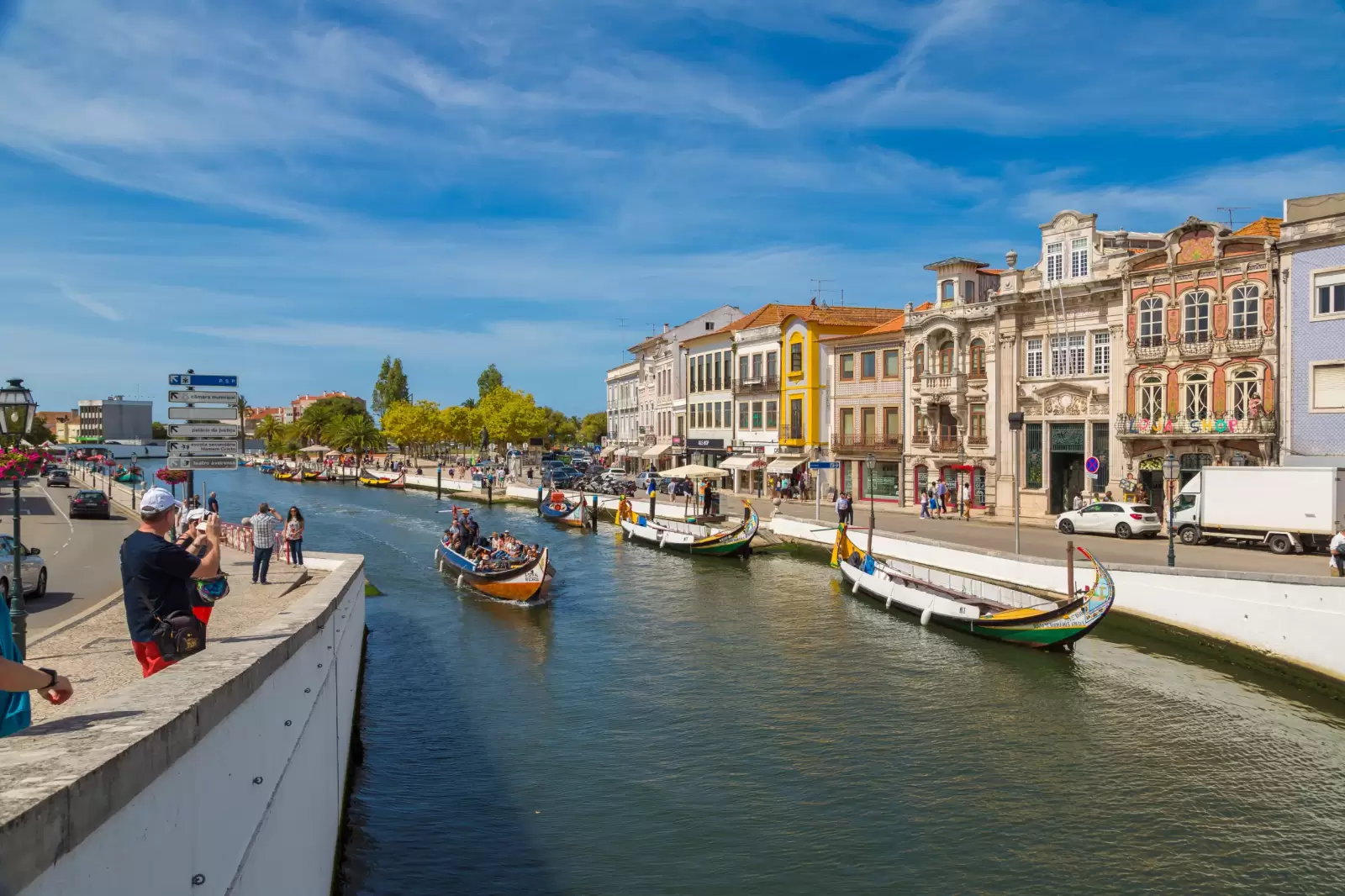 boats on main city canal in aveiro portugal in a beautiful boats on main city canal in aveiro portugal in a beautiful