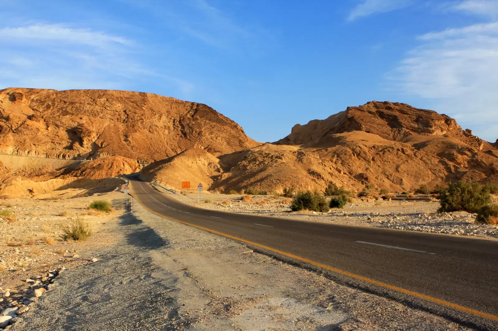 empty road in the negev desert israel