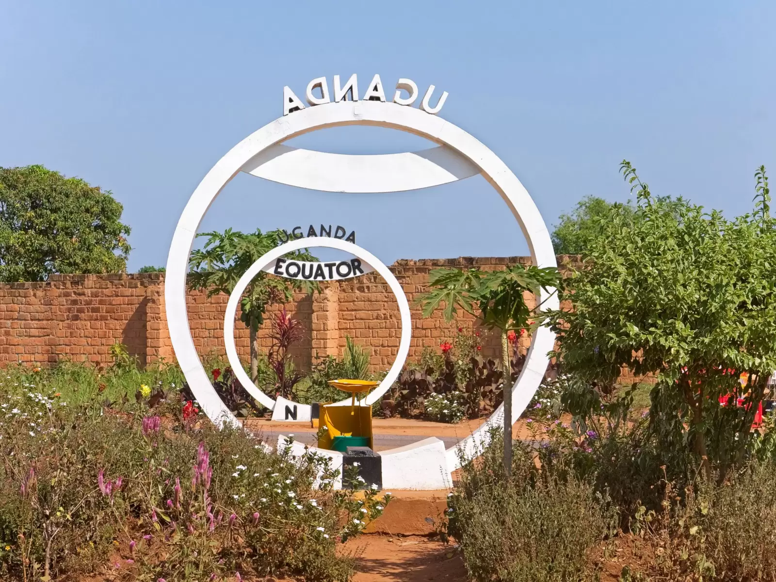 equator crossing sign monument in uganda equator crossing sign monument in uganda