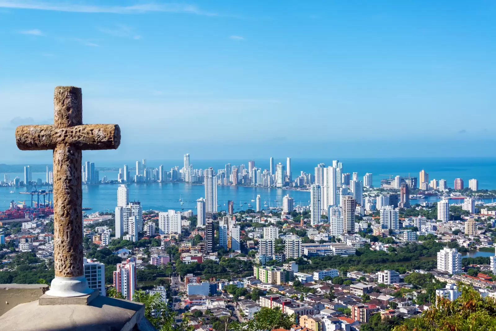 modern part of cartagena colombia with a stone cross in the foreground modern part of cartagena colombia with a stone cross in the foreground