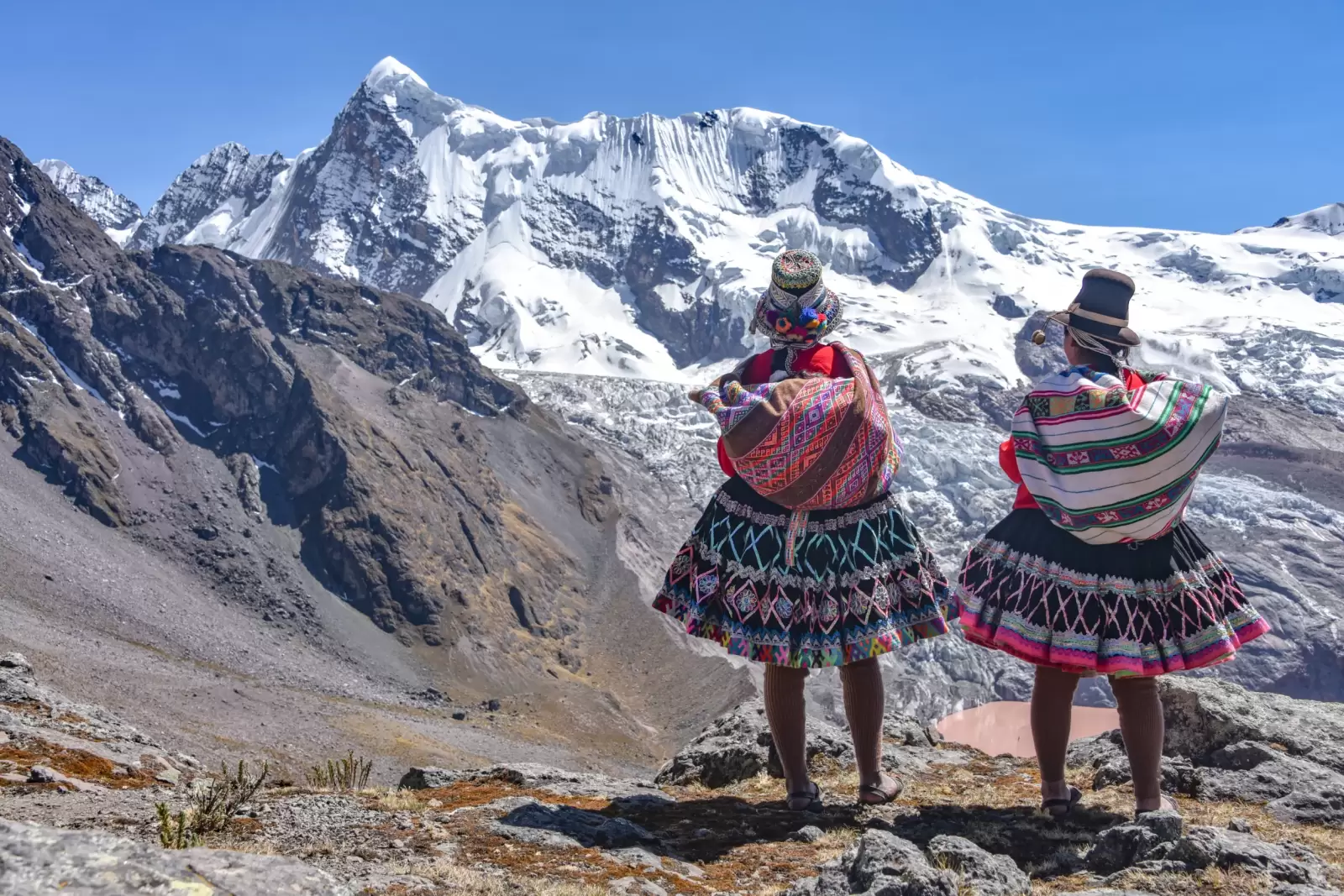 quechua girls admire andean mountain views on the ausangate trail cusco peru quechua girls admire andean mountain views on the ausangate trail cusco peru