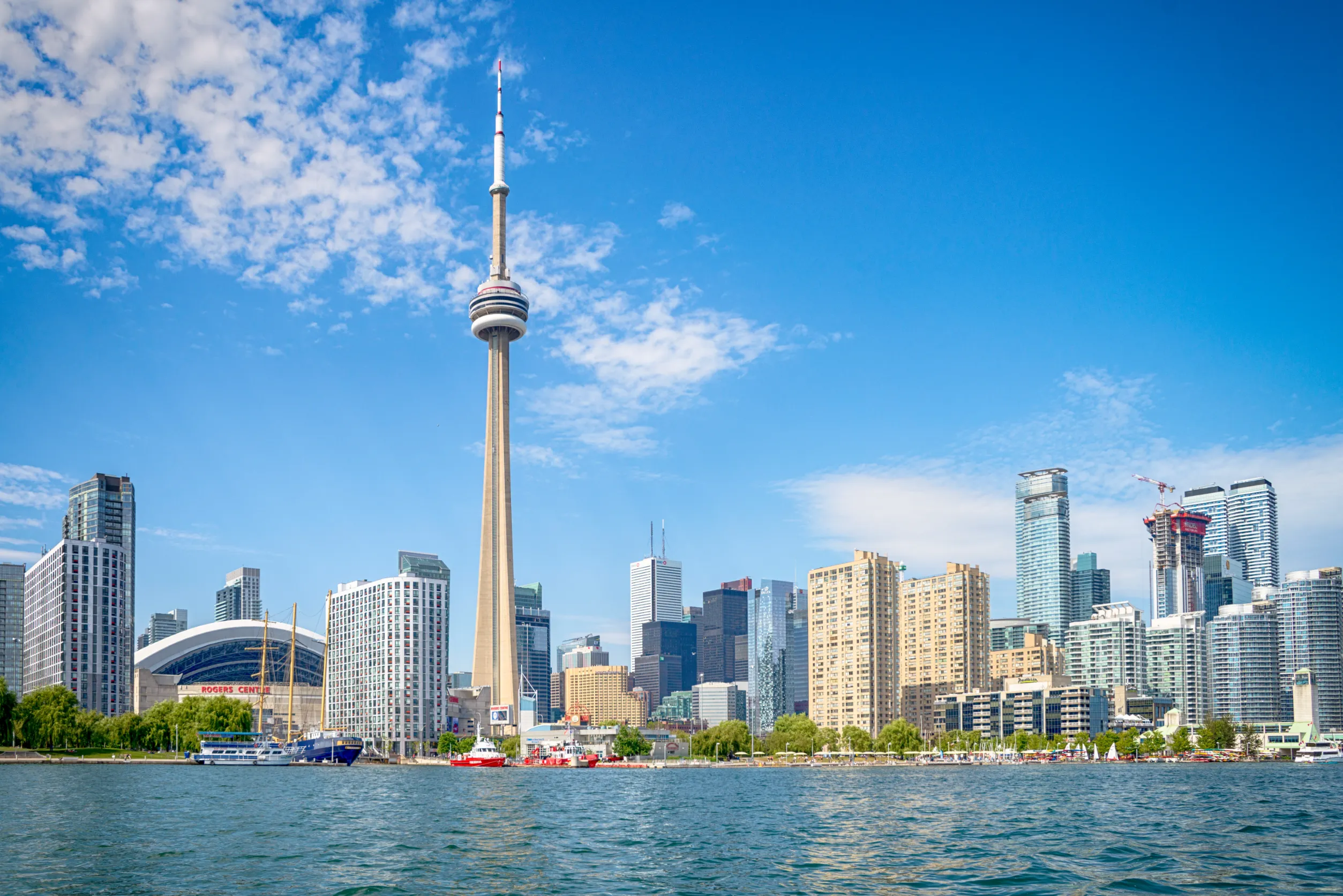 skyline of toront in canada from the lake ontario skyline of toront in canada from the lake ontario