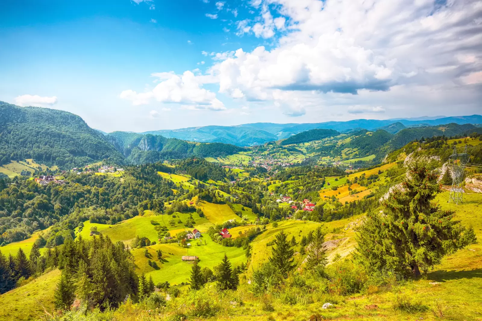 stunning alpine landscape with green fields and piatra craiului mountains stunning alpine landscape with green fields and piatra craiului mountains