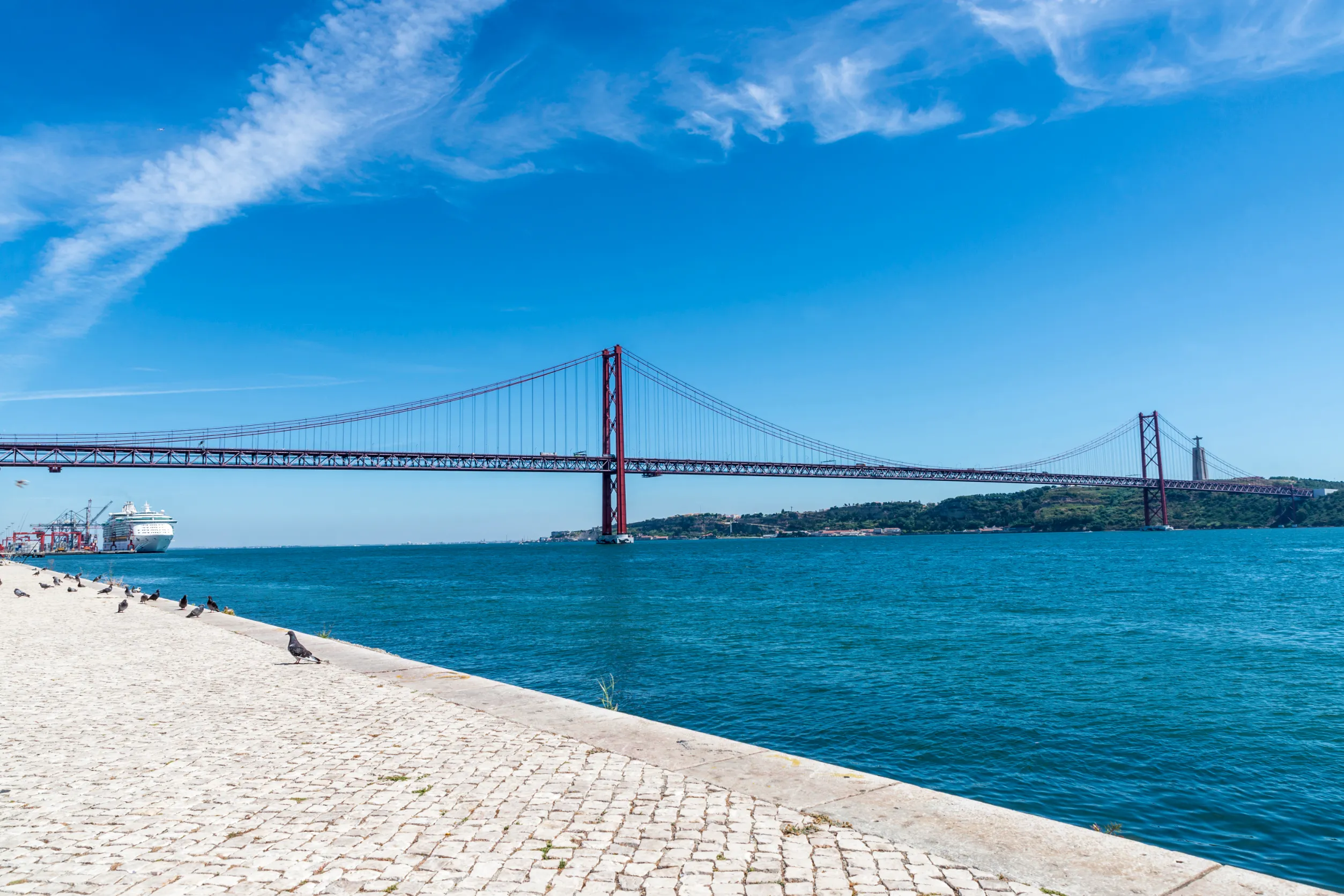 tagus river and cristo rei the statue of jesus in lisbon portugal tagus river and cristo rei the statue of jesus in lisbon portugal