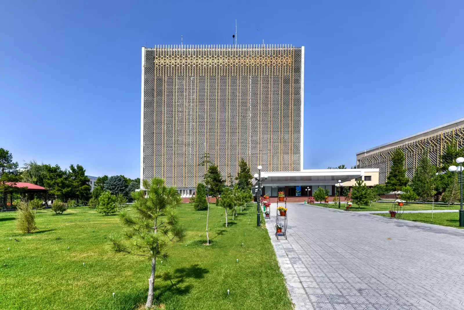 tall golden government office building in samarkand uzbekistan tall golden government office building in samarkand uzbekistan