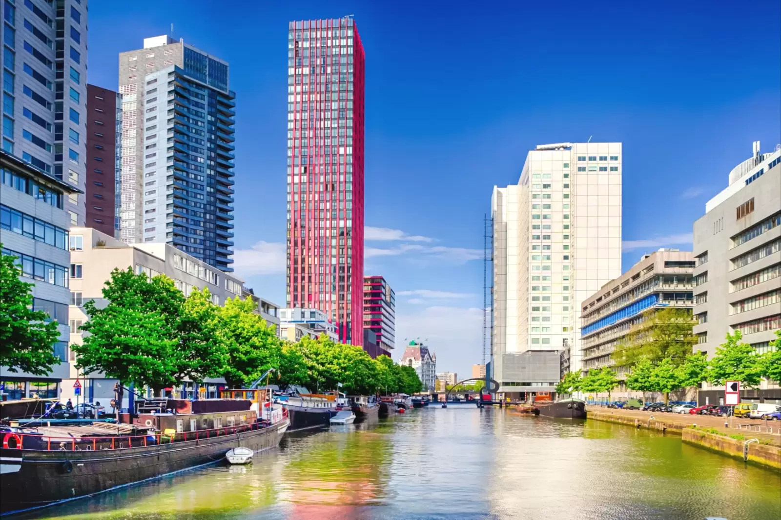 the water canal and lines of barges in rotterdam netherlands the water canal and lines of barges in rotterdam netherlands