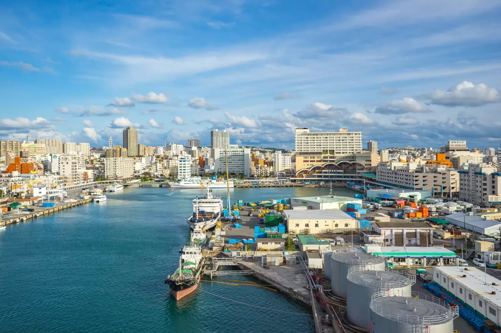 tomari port with okinawa city skyline in naha okinawa japan