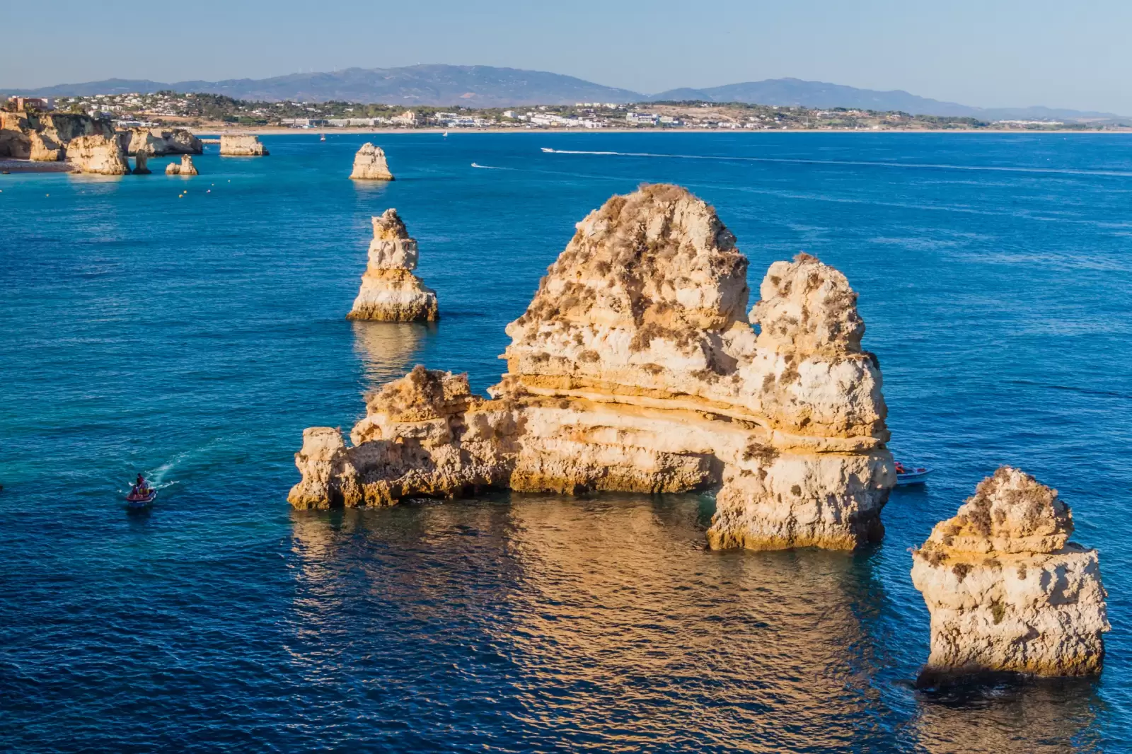 tourist boat at the cliffs lagos portugal tourist boat at the cliffs lagos portugal