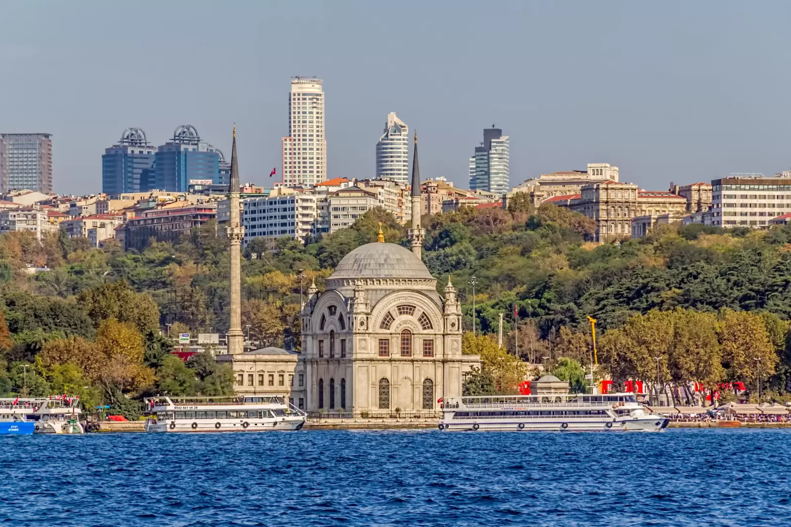 tourist ships crusing around dolmabahce mosque tourist ships crusing around dolmabahce mosque