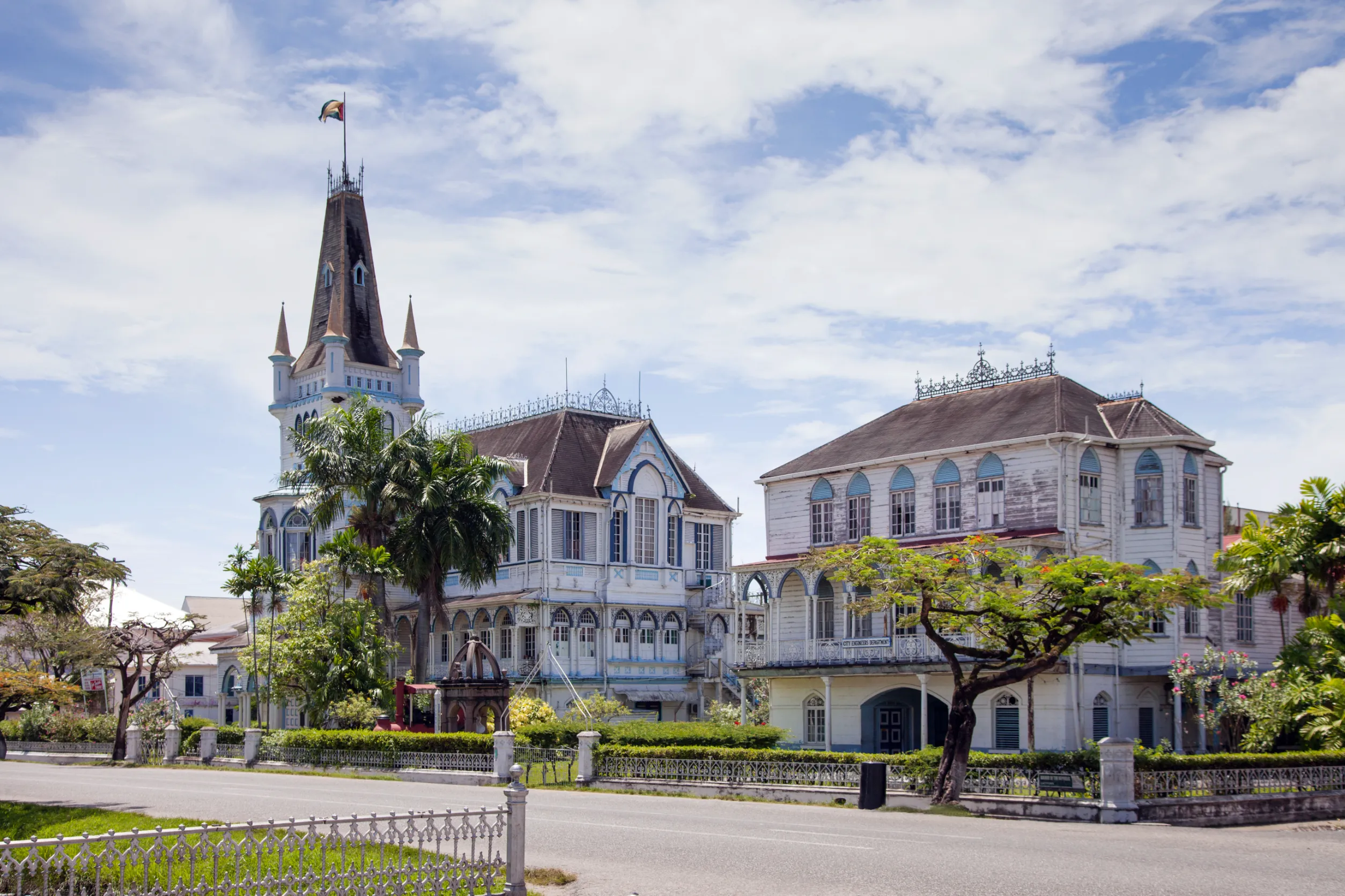 view of an old wooden fairy tale gothic building with spires and turrets view of an old wooden fairy tale gothic building with spires and turrets